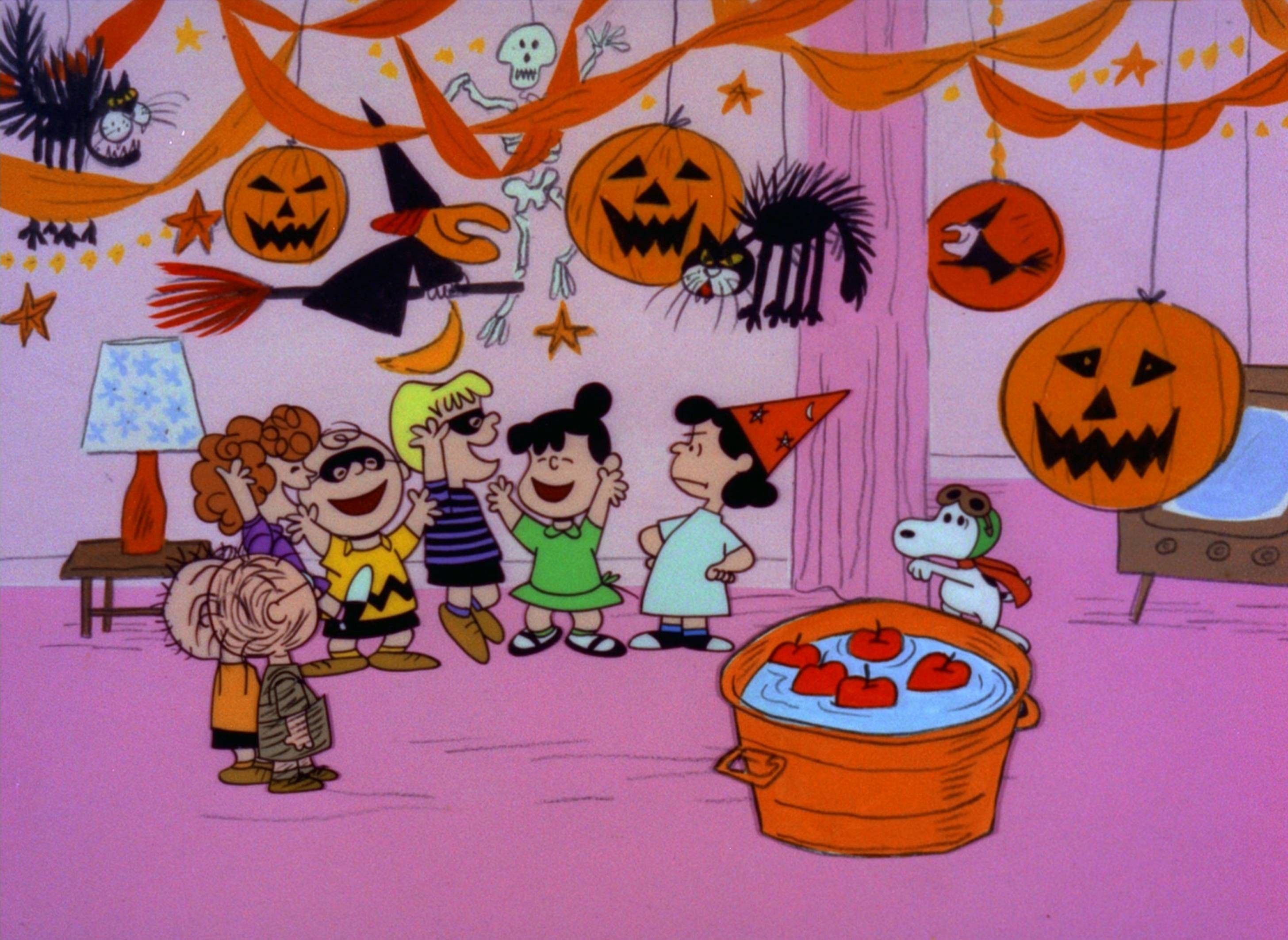 A cartoon of some children in halloween costumes - Snoopy, Halloween