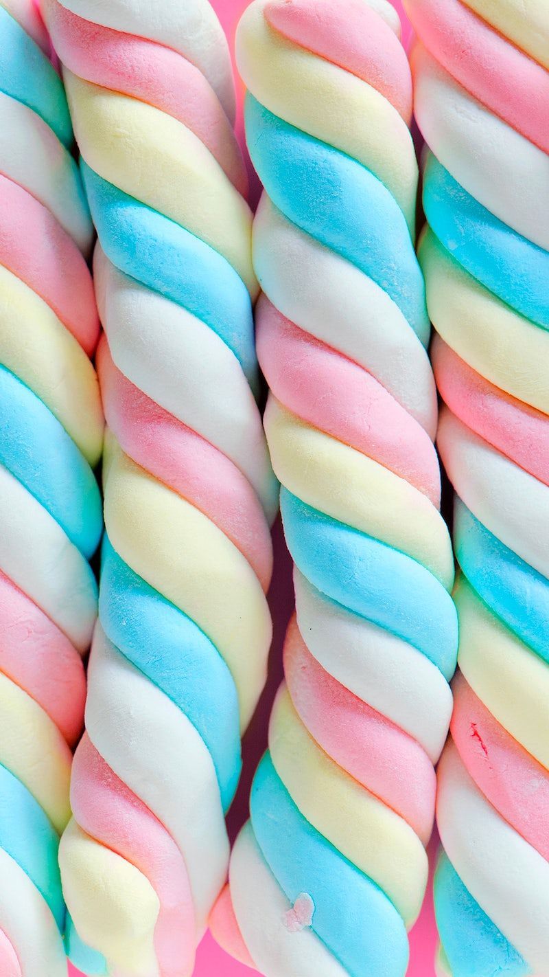 A close up of colorful marshmallows - Marshmallows, pastel rainbow, minimalist